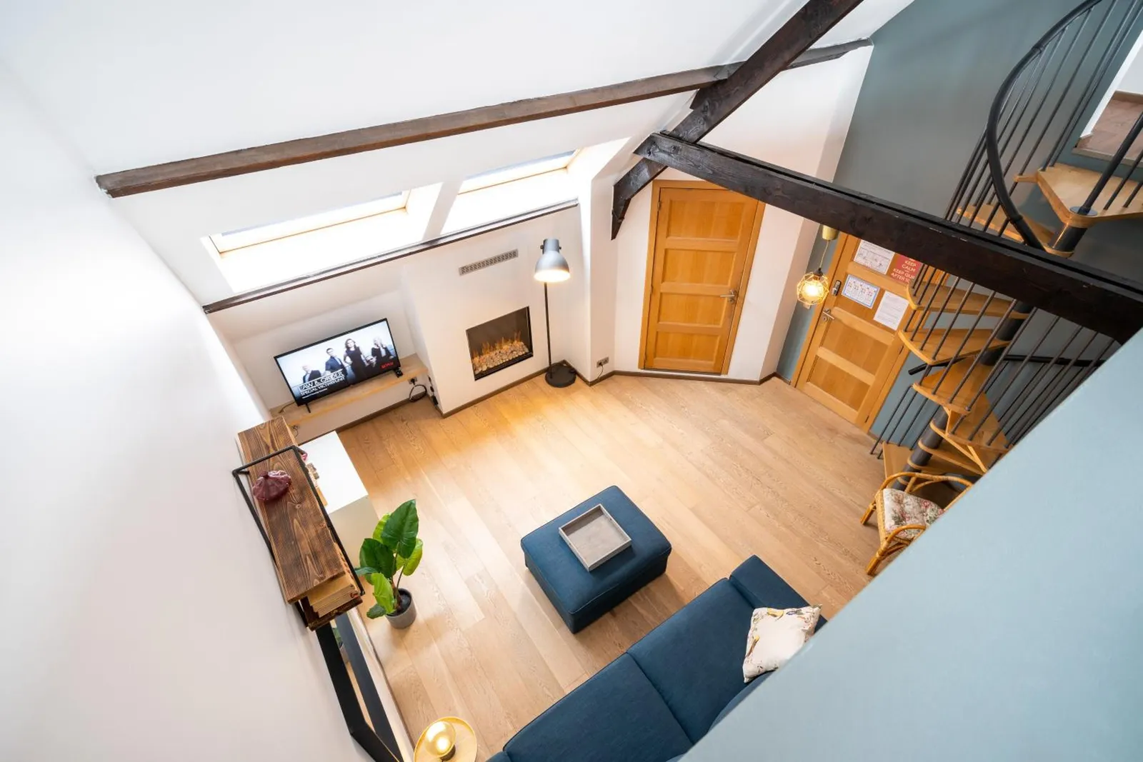 The sitting area of The Rose Tree seen from above, from the spiral staircase
